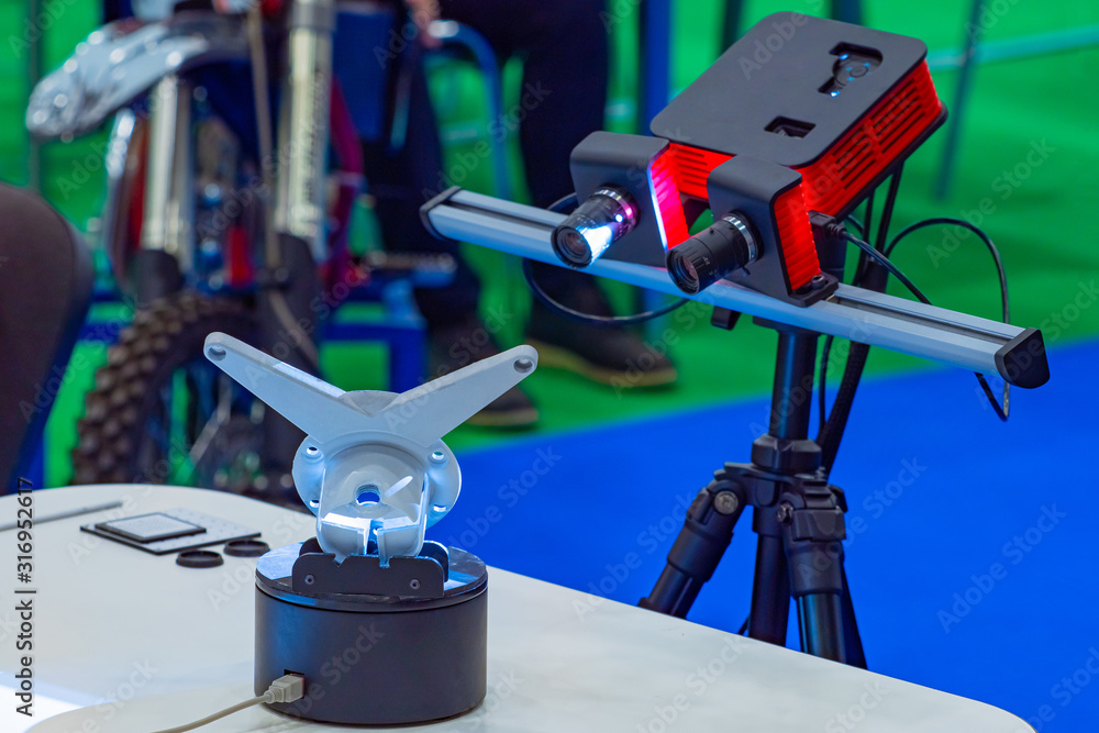 Poster 3d scanner. device scans a metal part. equipment for creating three-dimensional copies. 3d scanner d