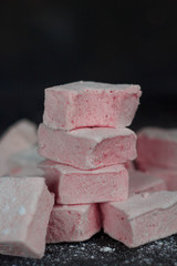diced marshmallows on a dark background