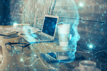 Multi exposure of work table with computer and brain hologram. Brainstorm concept.