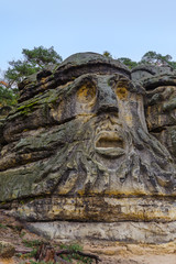Sculptures Devil's heads in the village Zelizy - Czech republic