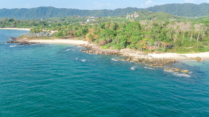 Aerial drone view of tropical beach from above, sea, sand and palm trees island beach landscape, Thailand