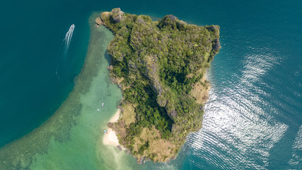 Aerial drone view of tropical islands, beaches and boats in blue clear Andaman sea water from...