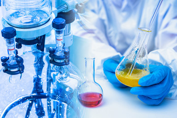 Pharmacological experiments. Rotary evaporator in a medical laboratory. A pharmacologist takes a sample for research. A man takes liquid from a test tube. Concept - a study of drugs for side effects