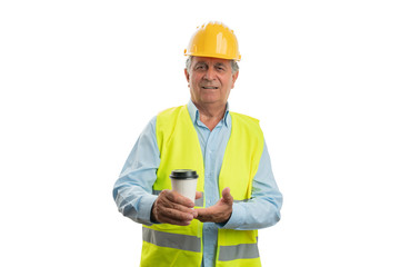Builder presenting coffee cup