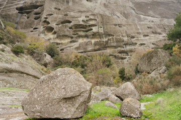 Meteora, Greece - Dec 19, 2019: Abandoned monastic cave houses known as 