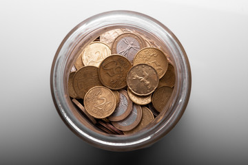 Euro coins in jar