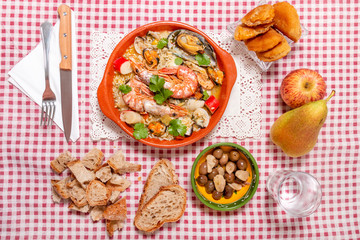 Traditional homemade meal of rice and seafood.