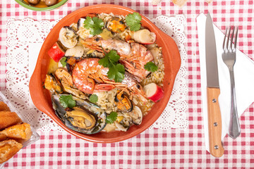Traditional homemade meal of rice and seafood.