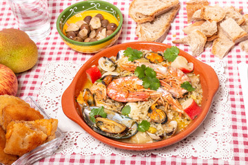 Traditional homemade meal of rice and seafood.