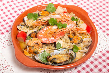 Traditional homemade meal of rice and seafood.
