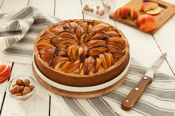 Tart with an apple. Freshly baked open apple pie. Gourmet pastries, traditional European cuisine.