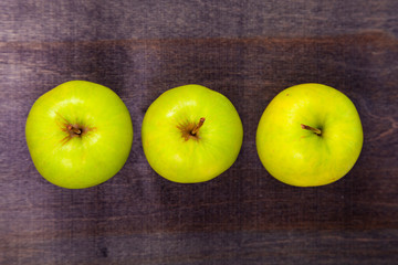 Three green apples