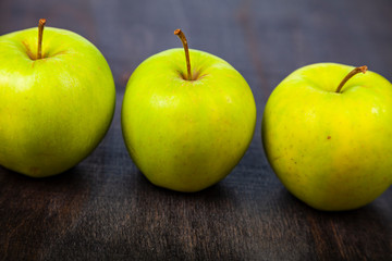 Three green apples