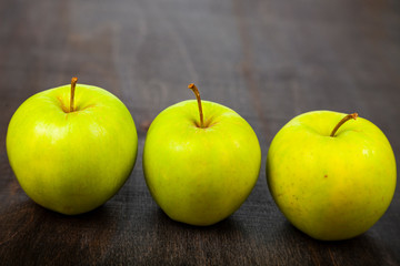 Three green apples