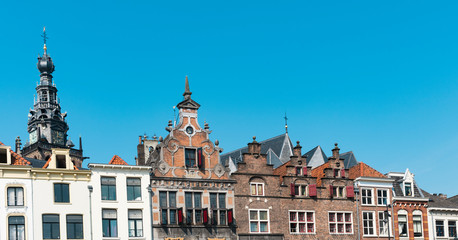 Obraz premium stepped gable houses and Kerkboog Gate on square Grote Markt in Nijmegen, The Netherland