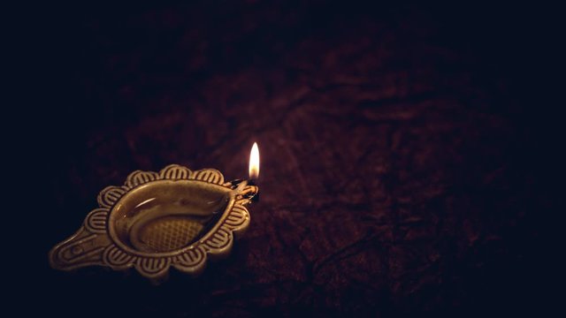 Diwali diya lamp burning close up