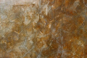The surface of the plaster that looks like rust