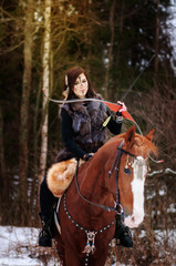 a Viking girl riding a red horse painted in black runes. holds a bow and shoots it