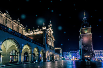 Fototapeta premium Colorful Christmas Krakow. Old Market Square and City Hall Tower