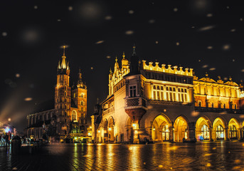 Fototapeta na wymiar Colorful Christmas Krakow. Old Market Square and City Hall Tower