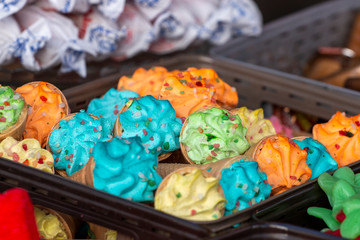 colorful cupcakes on the market