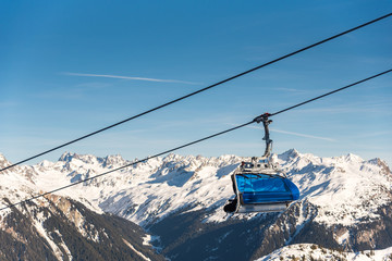 Ski cable lift in the Alps. Austrian Alps ski resort.