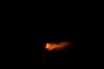 Ignition of match with sparks isolated on black background space for text fire concept passion...