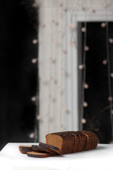 Fresh brown bread slice isolated on white background