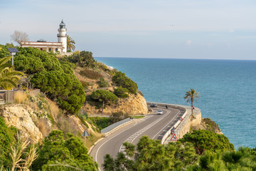 Fototapeta na wymiar Coastal road with the Mediterranean Sea in the background, Dark blue turquoise water