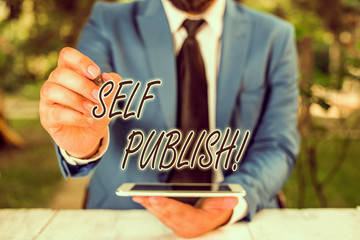 Word writing text Self Publish. Business photo showcasing writer publish piece of ones work...