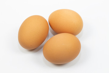 three eggs isolated on white background