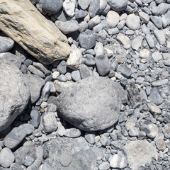 abstract image of rocks and pebbles on a greek beach