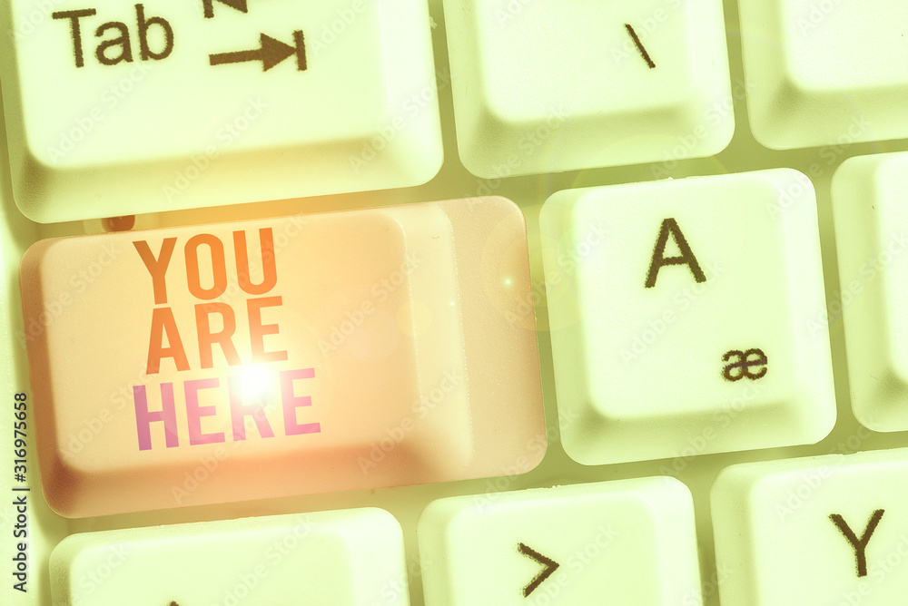 Poster handwriting text you are here. conceptual photo this is your location reference point global positio