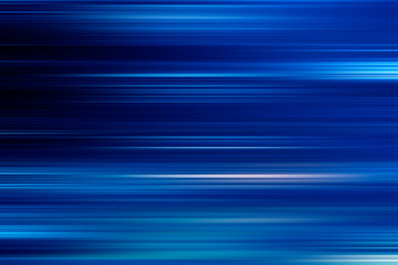 digitally generated image of blue light and stripes moving fast	