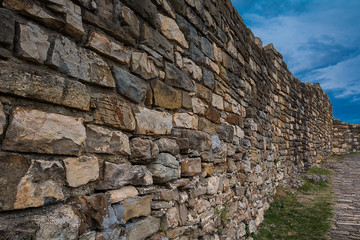 old stone wall of stones