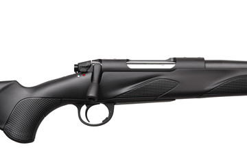 Modern bolt carbine isolated on white background. Weapons for hunting and sports. Black gun with...
