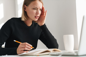 Blonde business woman in office