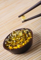 Concepts: fish oil capsules - fish in oriental cuisine