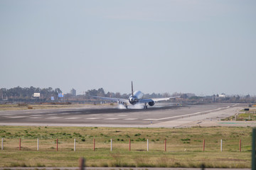 Plane landing at the airport.