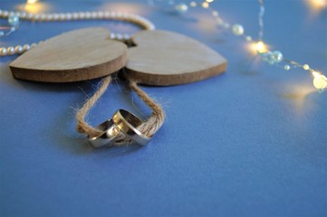 symbols of love two hearts connected with a rope ring as a symbol of marriage