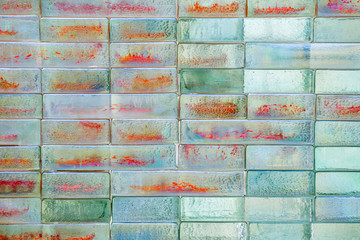 Silver and red glass blocks wall.