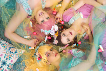 Pinup girls with colorful outfits.