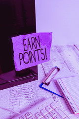Writing note showing Earn Points. Business concept for collecting scores in order qualify to win...