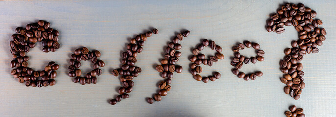 Banner of Coffee Inscription. Word Coffee on The Table near Cup.