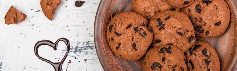 Banner of chocolate cookies with hearts. Flat lay
