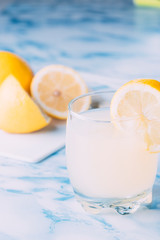 Glass of lemonade with the lemons cut from the bottom