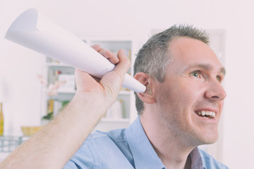 Fototapeta premium Man wearing deaf aid