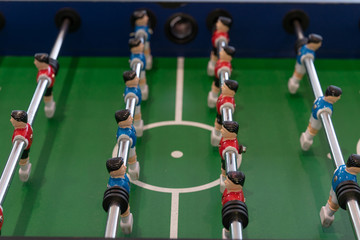Fototapeta premium Table football game, Soccer table with red and blue players