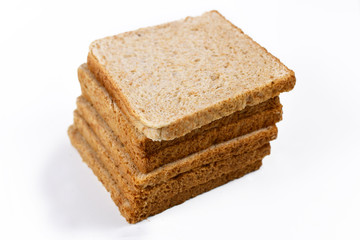 Pile of slices of wholegrain dinkel wheat toast bread