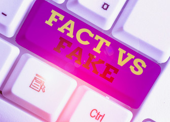 Handwriting text Fact Vs Fake. Conceptual photo Rivalry or products or information originaly made...